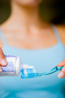 Paste on toothbrush.